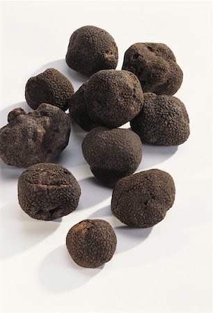 raro - Several black truffles Fotografie stock - Premium Royalty-Free, Codice: 659-01849087