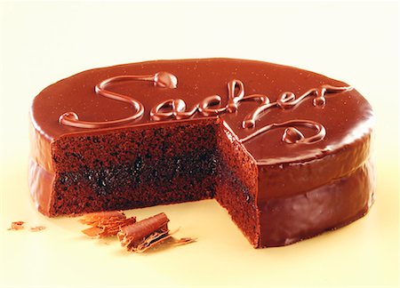 sacher - Sacher torte with the word ëSacherí, a piece cut Stock Photo - Premium Royalty-Free, Code: 659-01849295