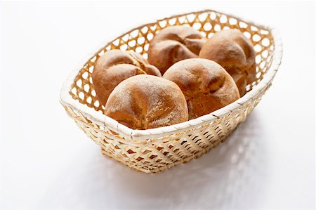 A bread basket with five bread rolls Stock Photo - Premium Royalty-Free, Code: 659-01849300