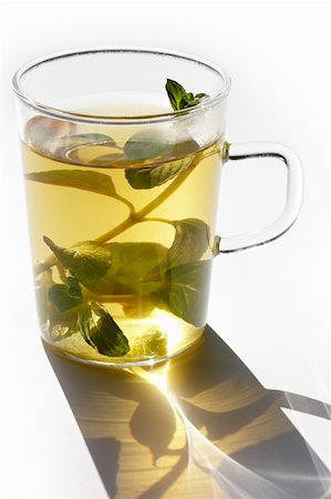 A glass of peppermint tea Stock Photo - Premium Royalty-Free, Code: 659-01849358