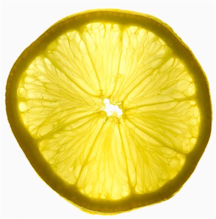 single lemon - A slice of lemon Foto de stock - Sin royalties Premium, Código: 659-01849353