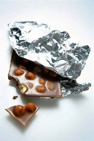 simsearch:659-01843015,k - Bar of nut chocolate with a piece broken off Stock Photo - Premium Royalty-Free, Code: 659-01849367