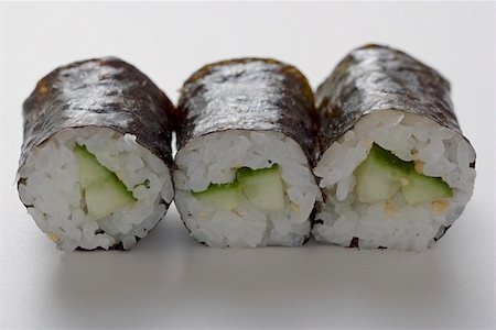 simsearch:659-07958870,k - Three maki sushi with cucumber Stock Photo - Premium Royalty-Free, Code: 659-01849581