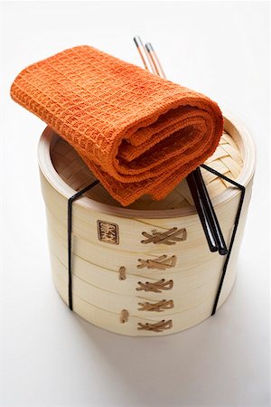 simsearch:659-01863745,k - Hand towel, chopsticks and bamboo steamer Stock Photo - Premium Royalty-Free, Code: 659-01849684