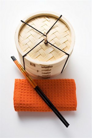 simsearch:659-01845916,k - Main serviette, baguettes et bambou vapeur Photographie de stock - Premium Libres de Droits, Code: 659-01849682