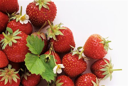 strawberries many - Strawberries with Blossoms Stock Photo - Premium Royalty-Free, Code: 659-01842239