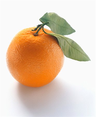 An Orange with Leaves Stock Photo - Premium Royalty-Free, Code: 659-01842251