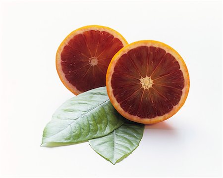 A Halved Blood Orange Foto de stock - Sin royalties Premium, Código: 659-01842253