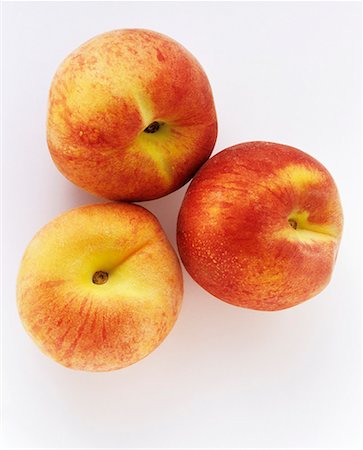 fresh peach - Three Peaches Stock Photo - Premium Royalty-Free, Code: 659-01842267