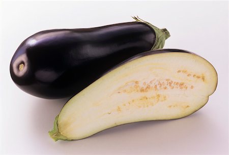 A Whole and Half Eggplant Stock Photo - Premium Royalty-Free, Code: 659-01842308