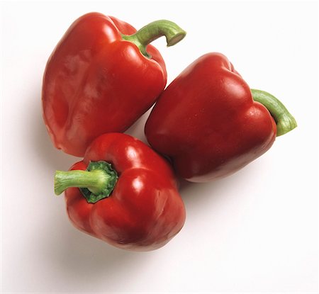 simsearch:659-03522192,k - Three Red Bell Peppers Stock Photo - Premium Royalty-Free, Code: 659-01842310