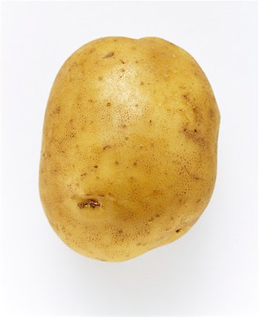 single potato - A Potato Stock Photo - Premium Royalty-Free, Code: 659-01842325