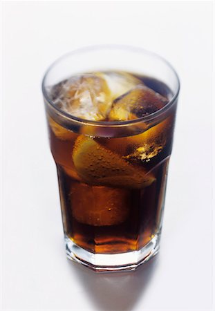 simsearch:659-03528502,k - A Glass of Cola with Lemon Stock Photo - Premium Royalty-Free, Code: 659-01842405