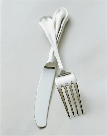 flatware - Crossed Fork and Knife Foto de stock - Sin royalties Premium, Código: 659-01842410