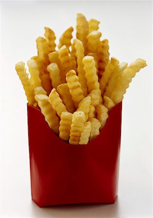 Chips in red fast food box Stock Photo - Premium Royalty-Free, Code: 659-01842458
