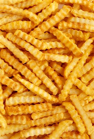 Crinkle Cut French Fries (Full Frame) Stock Photo - Premium Royalty-Free, Code: 659-01842453