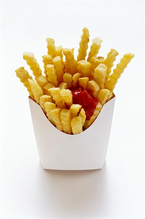 simsearch:659-06494742,k - Crinkle Cut French Fries in a White Box with Ketchup Foto de stock - Sin royalties Premium, Código: 659-01842462