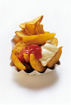 simsearch:659-03529173,k - Steak Fries with Ketchup and Mayonnaise Foto de stock - Sin royalties Premium, Código: 659-01842494