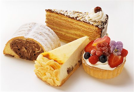 Four Assorted Cake Slices Stock Photo - Premium Royalty-Free, Code: 659-01842545
