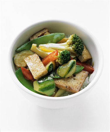 Tofu and Vegetable Stir Fry Over Rice Foto de stock - Sin royalties Premium, Código: 659-01842624