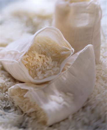 saco - Sacks of Uncooked Long Grain White Rice Foto de stock - Sin royalties Premium, Código: 659-01842764