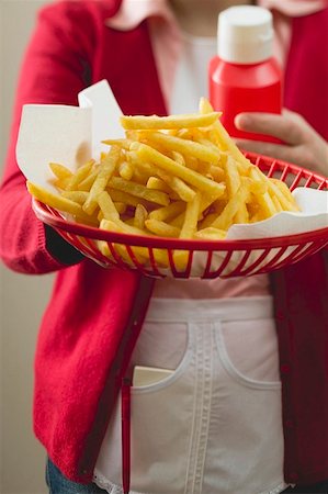 snack bar - Chips in plastic basket Stock Photo - Premium Royalty-Free, Code: 659-01842877