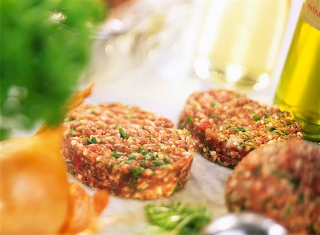 simsearch:659-01846050,k - Raw lamb burgers with herbs Stock Photo - Premium Royalty-Free, Code: 659-01842969