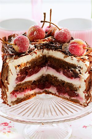 Black Forest cherry gateau on cake plate, pieces cut Stock Photo - Premium Royalty-Free, Code: 659-01843021