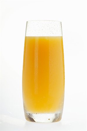 Orange juice in tall glass Stock Photo - Premium Royalty-Free, Code: 659-01843046