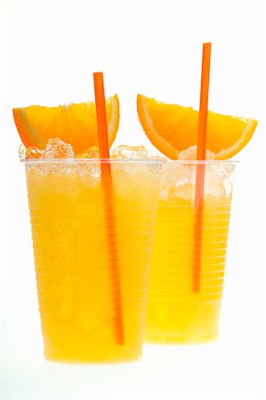 simsearch:659-01851750,k - Orange juice with crushed ice, orange wedges and straw Foto de stock - Sin royalties Premium, Código: 659-01843057