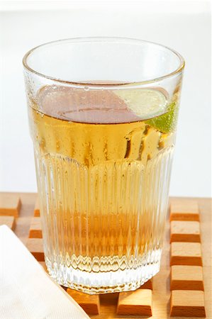 simsearch:659-03526783,k - Apple juice with wedge of lime in glass Stock Photo - Premium Royalty-Free, Code: 659-01843137