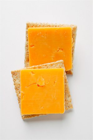 Cracker with Extra Sharp Cheddar Stock Photo - Premium Royalty-Free, Code: 659-01843170