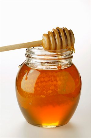 Honey in jar with honeycomb Stock Photo - Premium Royalty-Free, Code: 659-01843306