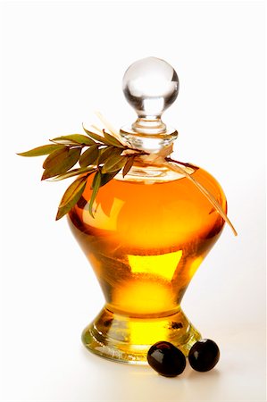 simsearch:659-01842370,k - Olive oil with olive twig and olives Stock Photo - Premium Royalty-Free, Code: 659-01843312