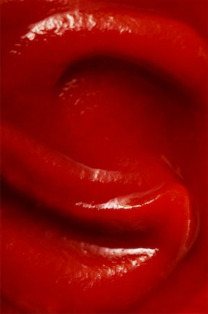 Ketchup (filling the picture) Stock Photo - Premium Royalty-Free, Code: 659-01843330