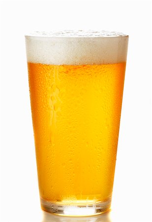 simsearch:659-03537336,k - Light beer in glass Stock Photo - Premium Royalty-Free, Code: 659-01843342