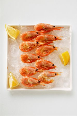 simsearch:659-01845188,k - Shrimps with lemon on plate with crushed ice Stock Photo - Premium Royalty-Free, Code: 659-01843378