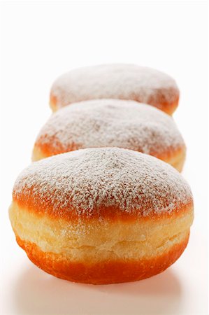 simsearch:659-01854280,k - Doughnuts with icing sugar Fotografie stock - Premium Royalty-Free, Codice: 659-01843531