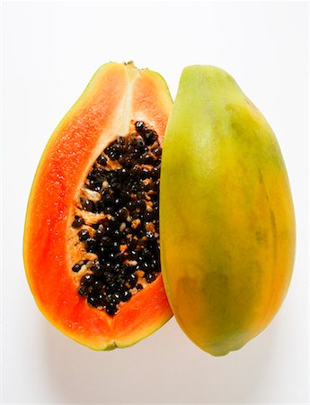 Halved papaya Stock Photo - Premium Royalty-Free, Code: 659-01843734