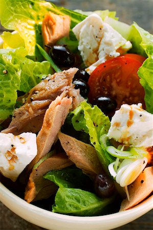 salad tuna - Romaine lettuce with tuna, sheep's cheese, tomatoes & olives Stock Photo - Premium Royalty-Free, Code: 659-01843748