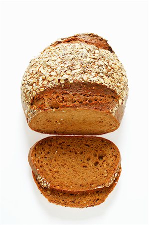 simsearch:659-03527834,k - Wholemeal bread with two slices cut Stock Photo - Premium Royalty-Free, Code: 659-01843789
