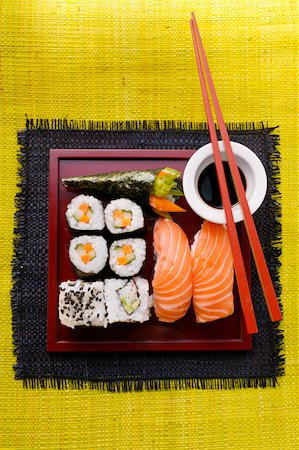 soy sauce sushi recipe - Assorted sushi on red platter, soy sauce Stock Photo - Premium Royalty-Free, Code: 659-01843949