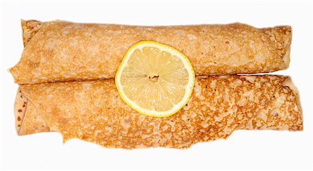 pancake top view - Two rolled-up pancakes with sugar and lemon Stock Photo - Premium Royalty-Free, Code: 659-01854218