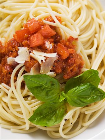 Spaghetti bolognese with basil and Parmesan Stock Photo - Premium Royalty-Free, Code: 659-01854739