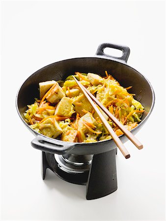 Stir-fried vegetables and tofu in wok Foto de stock - Sin royalties Premium, Código: 659-01854896