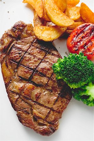 simsearch:659-07738895,k - Grilled rump steak with country potatoes and vegetables Stock Photo - Premium Royalty-Free, Code: 659-01854954