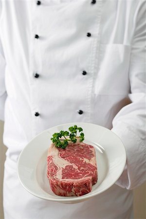 Beef steak with parsley Fotografie stock - Premium Royalty-Free, Codice: 659-01854971