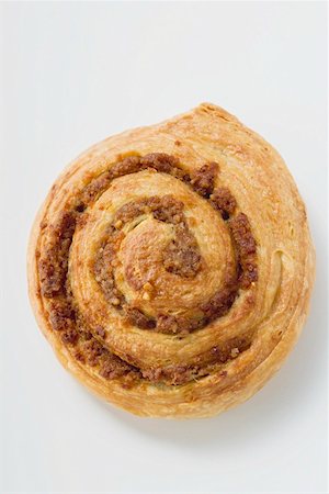 danish pastry recipe - A Danish pastry snail with nut filling Stock Photo - Premium Royalty-Free, Code: 659-01854983