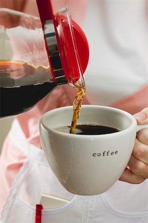 Pouring coffee into a cup Fotografie stock - Premium Royalty-Free, Codice: 659-01855035