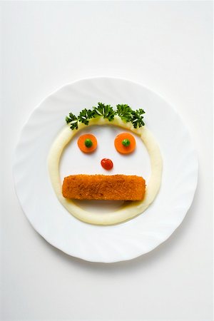 fish sticks - Face formed from fish finger, mashed potato and vegetables Stock Photo - Premium Royalty-Free, Code: 659-01855079